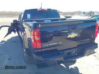 2018 Chevrolet Colorado 2WD Z71 with VIN 1GCGSDEN7J1117011, listed as a IAAI auction lot 41728108 with 51,618 mi miles and . Bid and sale history available at DreamBid. Image 3.
