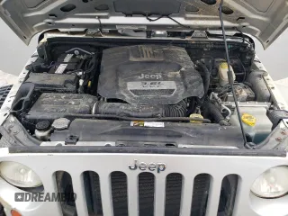 2012 Jeep Wrangler Sport z VIN 1C4AJWAG4CL185009, wystawiony jako Copart lot #61203395 z przebiegiem 93 534 mil mil oraz Szkoda całkowita • Salvage title. Historia ofert i sprzedaży dostępna na DreamBid. Obrazek 12.