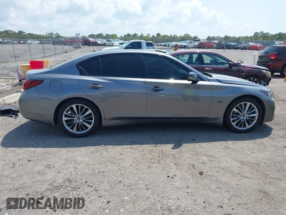 2018 Infiniti Q50 Luxe with VIN JN1EV7AP4JM590048, listed as a IAAI auction lot 41863410 with 55,727 mi miles and . Bid and sale history available at carsss.com. Image 13.