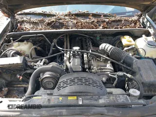 1993 Jeep Grand Cherokee Laredo with VIN 1J4GZ58S1PC680016, listed as a IAAI auction lot 41813392 with 149,520 mi miles. Bid and sale history available at carsss.com. Image 10.