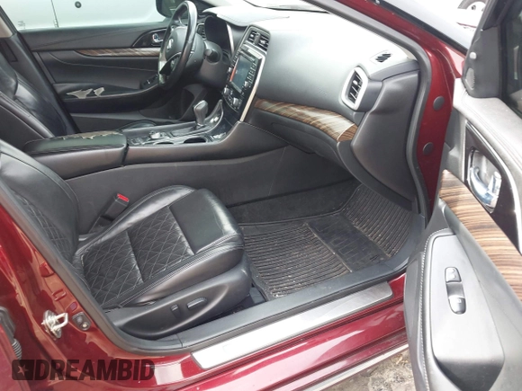 2016 Nissan Maxima SL with VIN 1N4AA6AP0GC396719, listed as a IAAI auction lot 41783950 with 210,850 mi miles and . Bid and sale history available at DreamBid. Image 5.