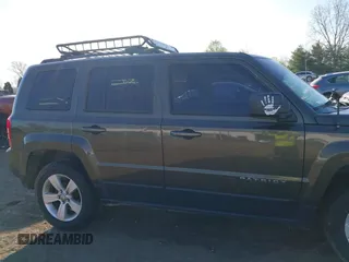 2016 Jeep Patriot High Altitude Edition with VIN 1C4NJRFB4GD581179, listed as a IAAI auction lot 42101912 with 168,254 mi miles. Bid and sale history available at carsss.com. Image 13.