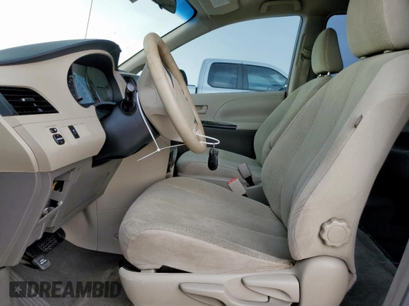 2011 Toyota Sienna with VIN 5TDZK3DC8BS026322, listed as a Copart auction lot 63670155 with Not provided miles and Salvage title. Bid and sale history available at DreamBid. Image 7.
