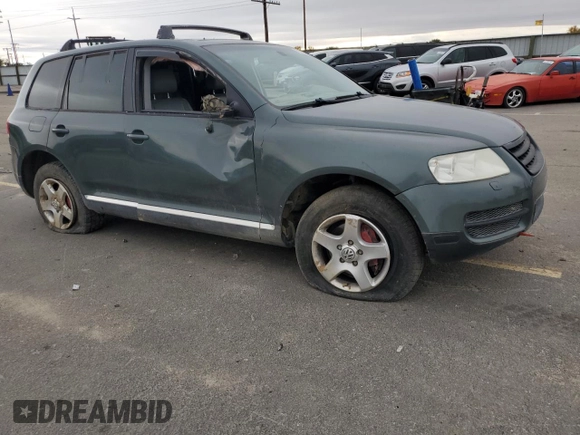 2004 Volkswagen Touareg with VIN WVGCM67L04D027410, listed as a Copart auction lot 79044964 with 100,509 mi miles and Salvage title. Bid and sale history available at DreamBid. Image 4.