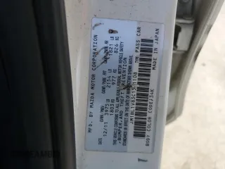 2012 Mazda 3 i Touring with VIN JM1BL1V83C1581108, listed as a Copart auction lot 55108215 with 170,001 mi miles and Salvage title. Bid and sale history available at DreamBid. Image 12.