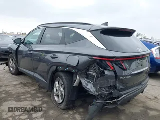 2023 Hyundai Tucson SEL z VIN KM8JBCAE9PU242486, wystawiony jako IAAI lot #41860406 z przebiegiem 25 294 mil mil oraz . Historia ofert i sprzedaży dostępna na DreamBid. Obrazek 3.