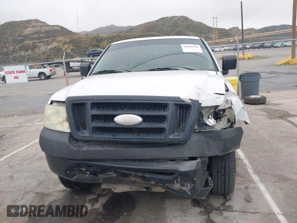 2007 Ford F-150 STX with VIN 1FTRX12W57FA45095, listed as a IAAI auction lot 41880108 with 168,216 mi miles and . Bid and sale history available at DreamBid. Image 12.