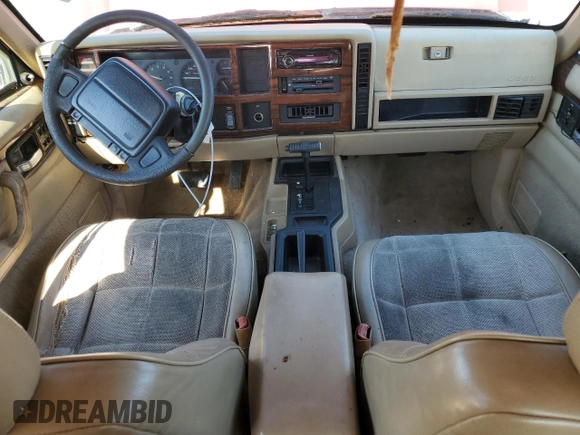1995 Jeep Cherokee Country with VIN 1J4FT78S9SL617148, listed as a Copart auction lot 43015025 with 196,408 mi miles and Clean title. Bid and sale history available at DreamBid. Image 8.