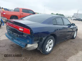 2013 Dodge Charger SE with VIN 2C3CDXBG9DH711044, listed as a IAAI auction lot 41915565 with 156,248 mi miles. Bid and sale history available at carsss.com. Image 4.