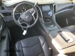 2015 Cadillac Escalade ESV Platinum z VIN 1GYS4UKJ7FR609546, wystawiony jako Copart lot #77941594 z przebiegiem 168 117 mil mil oraz Czysty tytuł • Clean title. Historia ofert i sprzedaży dostępna na DreamBid. Obrazek 8.