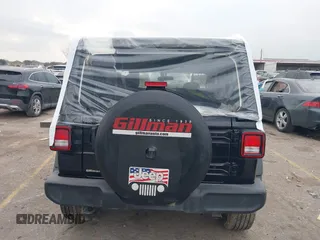 2021 Jeep Wrangler 80th Anniversary with VIN 1C4GJXAN0MW669192, listed as a IAAI auction lot 41465445 with 74,506 mi miles and . Bid and sale history available at DreamBid. Image 17.