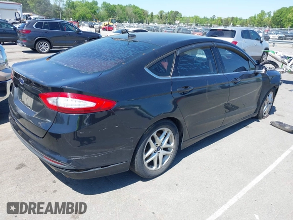 2015 Ford Fusion SE with VIN 3FA6P0H71FR258615, listed as a IAAI auction lot 41994439 with 185,410 mi miles and . Bid and sale history available at carsss.com. Image 4.