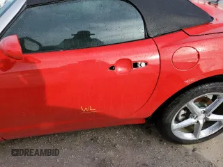 2009 Saturn Sky z VIN 1G8MN35B79Y103875, wystawiony jako Copart lot #74669844 z przebiegiem Nie podano mil oraz Szkody całkowita. Historia ofert i sprzedaży dostępna na DreamBid. Obrazek 12.
