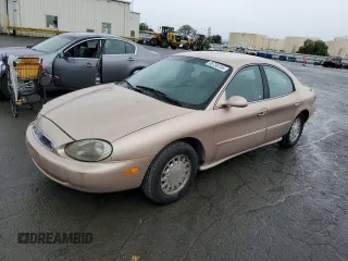1996 Mercury Sable LS z VIN 1MELM53S0TA607489, wystawiony jako Copart lot #85730734 z przebiegiem 113 214 mil mil oraz Szkody całkowita. Historia ofert i sprzedaży dostępna na DreamBid. Obrazek 1.
