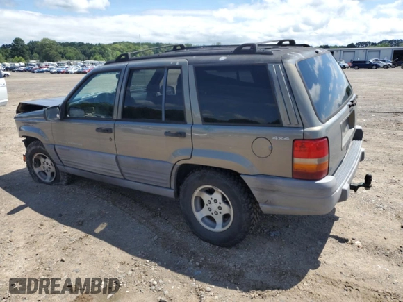 1997 Jeep Grand Cherokee Laredo with VIN 1J4GZ58S7VC505069, listed as a Copart auction lot 63255945 with 127,552 mi miles and Salvage title. Bid and sale history available at DreamBid. Image 2.
