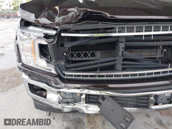 2019 Ford F-150 XL with VIN 1FTEW1CB6KKC92946, listed as a IAAI auction lot 41652249 with 133,883 mi miles and . Bid and sale history available at carsss.com. Image 6.