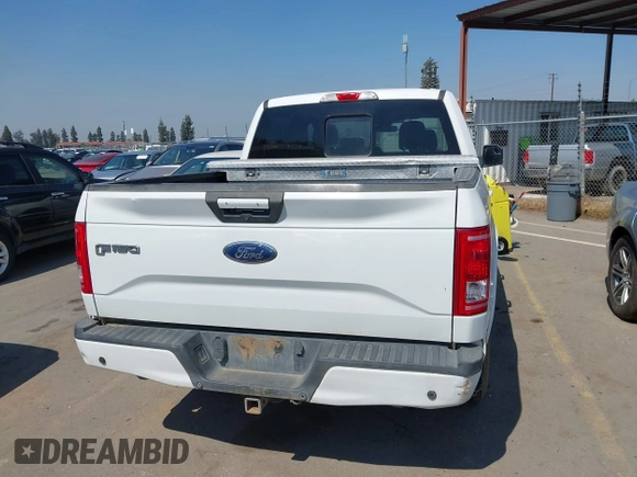 2015 Ford F-150 XLT with VIN 1FTEW1EP0FFA16253, listed as a IAAI auction lot 41852006 with 313,018 mi miles. Bid and sale history available at carsss.com. Image 16.