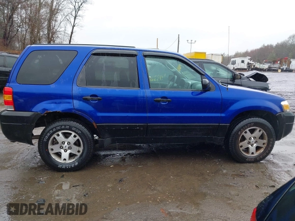 2005 Ford Escape XLT with VIN 1FMCU93125KA41795, listed as a IAAI auction lot 41931869 with 156,421 mi miles and . Bid and sale history available at DreamBid. Image 13.