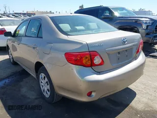 2009 Toyota Corolla with VIN 1NXBU40E59Z156570, listed as a IAAI auction lot 42417219 with 157,388 mi miles and . Bid and sale history available at DreamBid. Image 3.