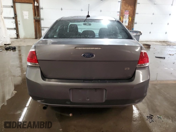 2010 Ford Focus SE with VIN 1FAHP3FN1AW146737, listed as a Copart auction lot 76261654 with 140,988 mi miles and Salvage Title. Bid and sale history available at DreamBid. Image 6.