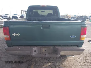 1997 Ford Ranger XLT with VIN 1FTDR15X5VPA65640, listed as a IAAI auction lot 41436818 with 212,661 mi miles. Bid and sale history available at carsss.com. Image 6.