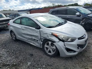 2013 Hyundai Elantra Coupe GS PZEV with VIN KMHDH6AE2DU023460, listed as a Copart auction lot 71382144 with 124,578 mi miles and Salvage Title. Bid and sale history available at carsss.com. Image 4.