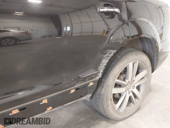 2011 Audi Q7 Premium Plus with VIN WA1LMAFE4BD001149, listed as a IAAI auction lot 42035843 with 140,911 mi miles and . Bid and sale history available at DreamBid. Image 6.