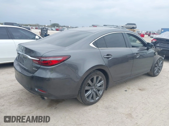 2020 Mazda 6 Touring with VIN JM1GL1VM5L1511578, listed as a IAAI auction lot 41704099 with 34,540 mi miles. Bid and sale history available at carsss.com. Image 4.