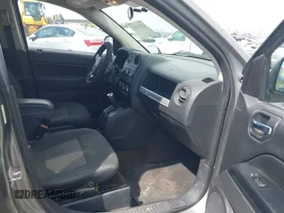 2014 Jeep Compass Sport with VIN 1C4NJCBA0ED524145, listed as a IAAI auction lot 42171212 with 187,257 mi miles. Bid and sale history available at carsss.com. Image 5.