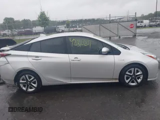 2017 Toyota Prius Two with VIN JTDKARFU4H3043433, listed as a IAAI auction lot 42310201 with 50,715 mi miles and . Bid and sale history available at DreamBid. Image 13.