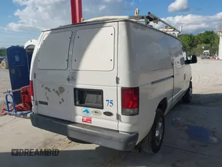 2005 Ford Econoline Cargo with VIN 1FTNE24L35HA46731, listed as a IAAI auction lot 41543863 with 179,541 mi miles. Bid and sale history available at carsss.com. Image 4.