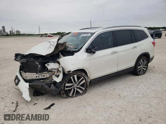 2017 Honda Pilot Touring with VIN 5FNYF5H95HB015365, listed as a Copart auction lot 52371205 with 153,141 mi miles and Salvage title. Bid and sale history available at DreamBid. Image 1.