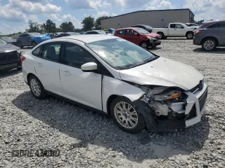 2012 Ford Focus SE with VIN 1FAHP3F2XCL406031, listed as a Copart auction lot 61961385 with 165,343 mi miles and Salvage title. Bid and sale history available at DreamBid. Image 4.