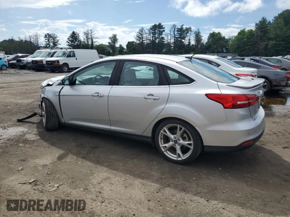 2015 Ford Focus Titanium with VIN 1FADP3J27FL285842, listed as a Copart auction lot 61159935 with 79,215 mi miles and Salvage title. Bid and sale history available at DreamBid. Image 2.