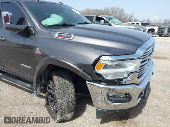 2019 Ram 2500 Laramie with VIN 3C6UR5FL2KG630341, listed as a IAAI auction lot 41742788 with 95,292 mi miles and . Bid and sale history available at DreamBid. Image 6.