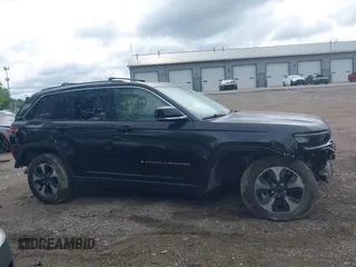 2022 Jeep Grand Cherokee with VIN 1C4RJYB69N8715243, listed as a IAAI auction lot 42319323 with 23,405 mi miles and . Bid and sale history available at DreamBid. Image 14.
