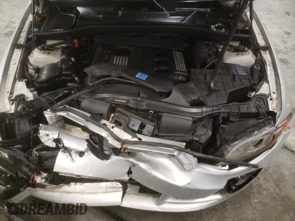 2011 BMW 1 Series 128i with VIN WBAUL7C52BVM80814, listed as a Copart auction lot 45150975 with 186,716 mi miles and Salvage title. Bid and sale history available at DreamBid. Image 11.