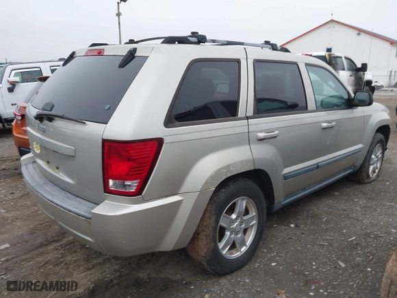 2007 Jeep Grand Cherokee Laredo with VIN 1J8GR48K17C537088, listed as a IAAI auction lot 41845987 with 143,661 mi miles. Bid and sale history available at carsss.com. Image 4.