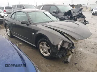 2004 Ford Mustang Standard z VIN 1FAFP40414F105171, wystawiony jako IAAI lot #41754232 z przebiegiem Nie podano mil oraz . Historia ofert i sprzedaży dostępna na DreamBid. Obrazek 1.