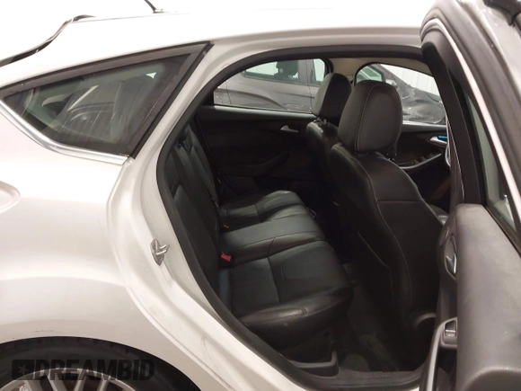 2014 Ford Focus Titanium with VIN 1FADP3N27EL110287, listed as a IAAI auction lot 42210697 with 107,741 mi miles and . Bid and sale history available at DreamBid. Image 8.