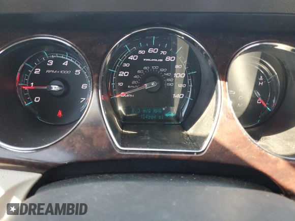 2011 Ford Taurus Limited with VIN 1FAHP2FW6BG142472, listed as a Copart auction lot 58534985 with 154,984 mi miles and Salvage title. Bid and sale history available at DreamBid. Image 9.