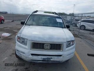 2007 Honda Ridgeline RTX with VIN 2HJYK16307H544780, listed as a IAAI auction lot 42169545 with 174,495 mi miles. Bid and sale history available at carsss.com. Image 6.