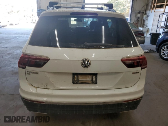 2020 Volkswagen Tiguan SE with VIN 3VV2B7AXXLM058031, listed as a Copart auction lot 76522644 with 34,361 mi miles and Salvage Title. Bid and sale history available at DreamBid. Image 6.
