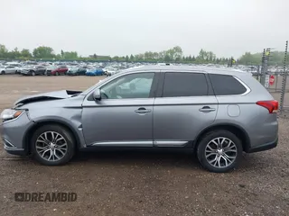 2018 Mitsubishi Outlander SE z VIN JA4AD3A35JZ064058, wystawiony jako IAAI lot #42311265 z przebiegiem 79 291 mil mil oraz . Historia ofert i sprzedaży dostępna na DreamBid. Obrazek 14.