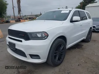 2019 Dodge Durango GT Plus with VIN 1C4RDHDGXKC650747, listed as a IAAI auction lot 42556068 with 141,830 mi miles and . Bid and sale history available at DreamBid. Image 2.