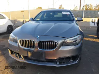 2014 BMW 5 Series 535i with VIN WBA5B1C54ED479873, listed as a IAAI auction lot 41338061 with 75,097 mi miles and . Bid and sale history available at DreamBid. Image 12.