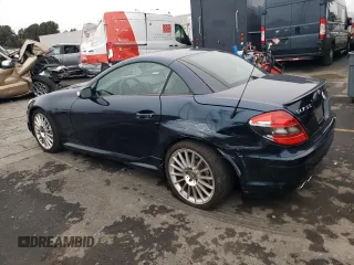 2006 Mercedes-Benz SLK-Class 5.5L AMG with VIN WDBWK73FX6F101788, listed as a Copart auction lot 86853414 with 51,995 mi miles and Salvage Title. Bid and sale history available at carsss.com. Image 2.