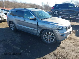 2018 Jeep Grand Cherokee Limited with VIN 1C4RJFBG5JC144693, listed as a IAAI auction lot 41094972 with 107,250 mi miles and . Bid and sale history available at DreamBid. Image 1.