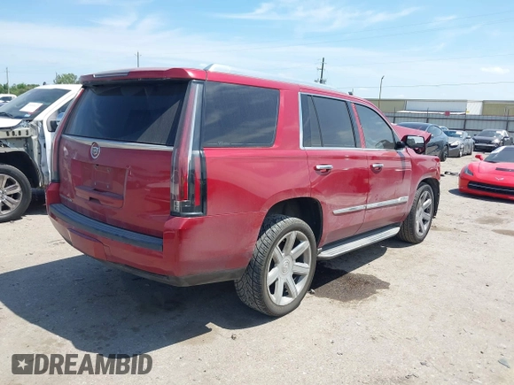 2015 Cadillac Escalade Luxury z VIN 1GYS3BKJ3FR275149, wystawiony jako IAAI lot #42052367 z przebiegiem 111 133 mil mil oraz . Historia ofert i sprzedaży dostępna na DreamBid. Obrazek 4.