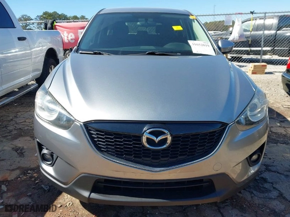 2015 Mazda CX-5 Touring with VIN JM3KE2CY0F0435575, listed as a IAAI auction lot 41652819 with 130,339 mi miles. Bid and sale history available at carsss.com. Image 12.
